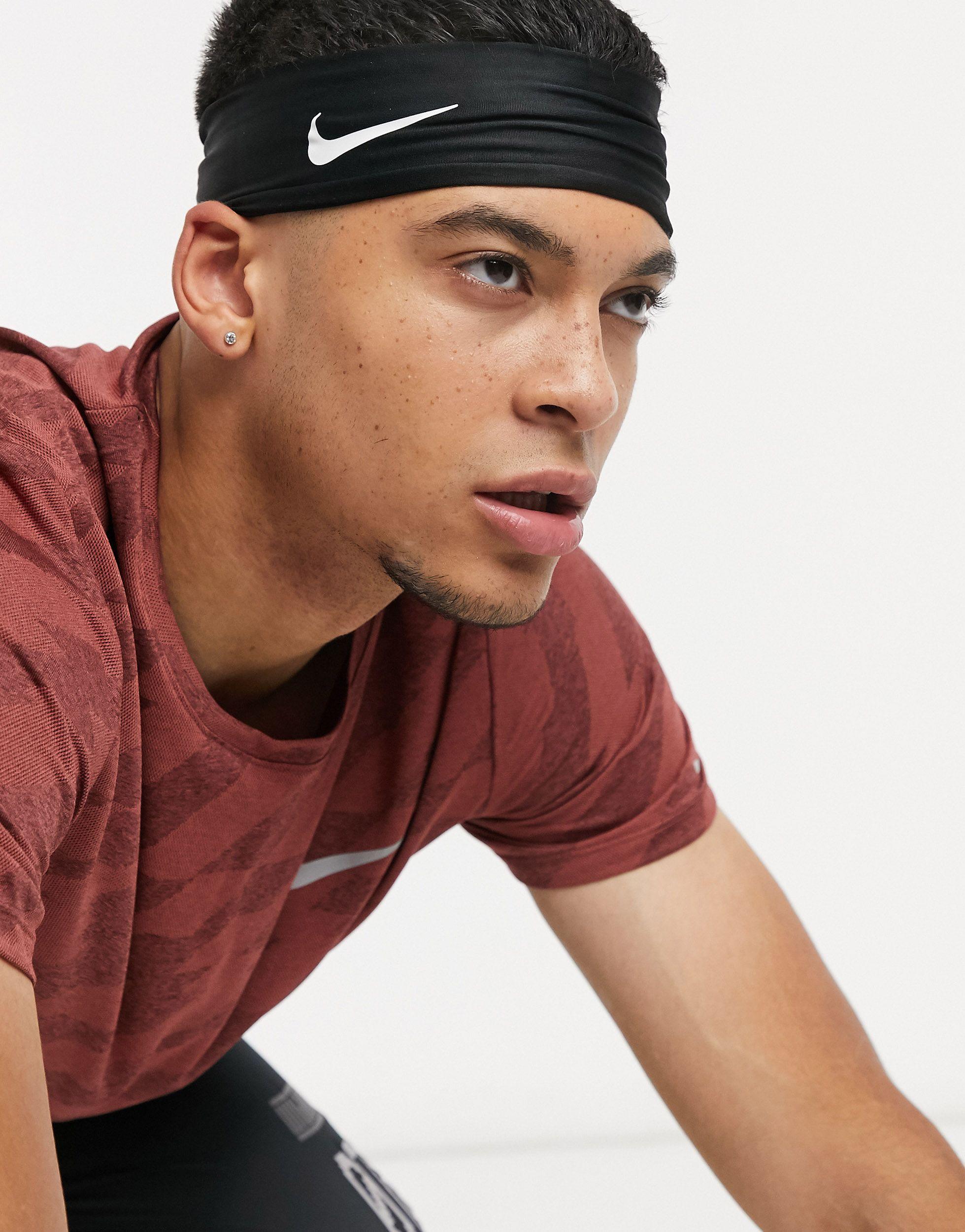 Nike Training – pelziges haarband in Schwarz | Lyst DE