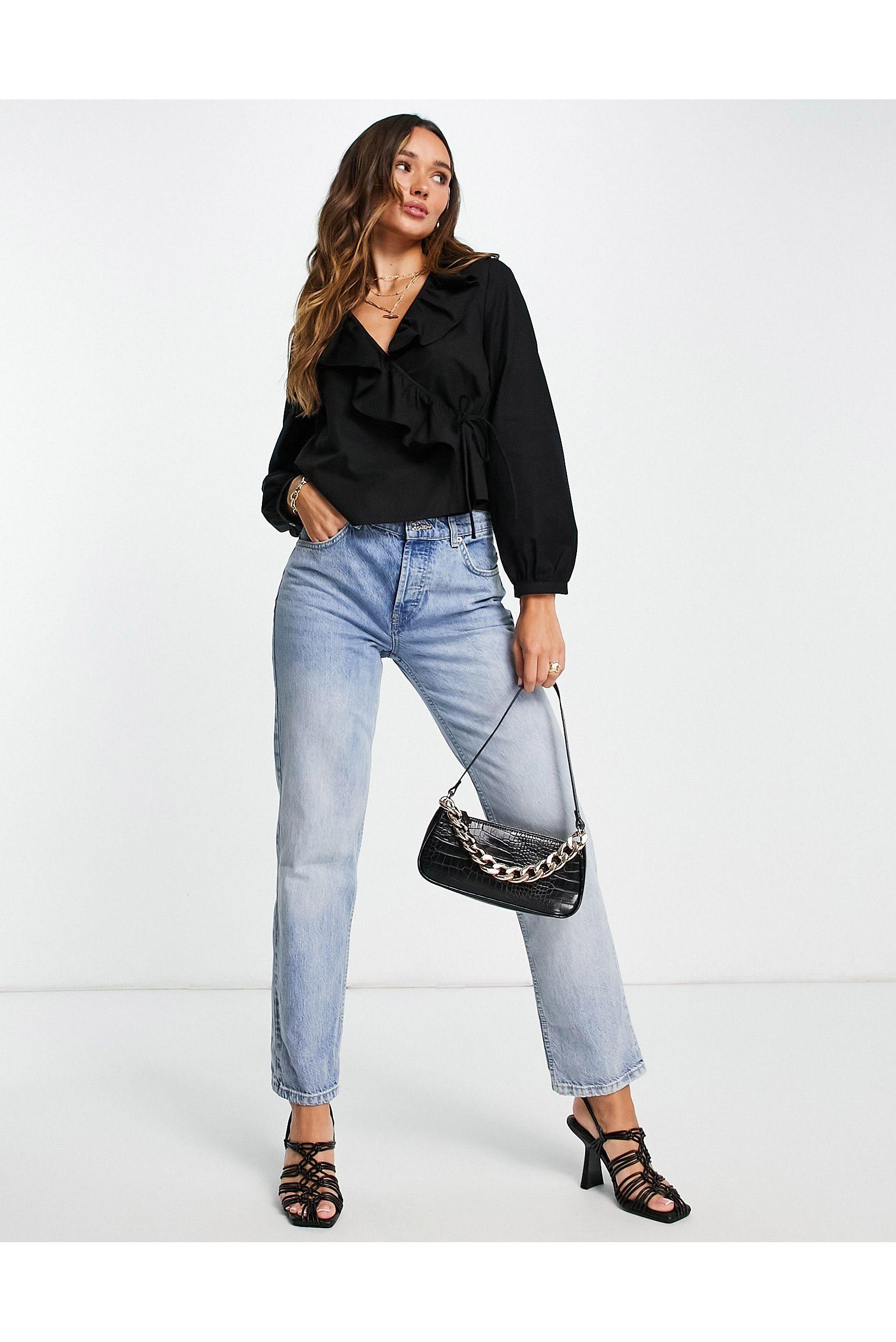 Blusa negra cruzada con volantes Mango de color Negro Lyst