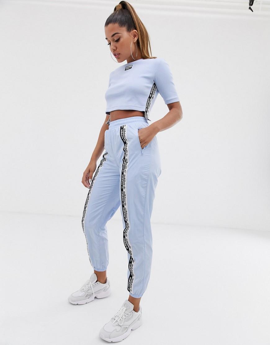 adidas Originals Synthetisch Ryv - Joggingbroek Met Hoge Taille En Streep  In Lichtblauw in het Blauw - Lyst