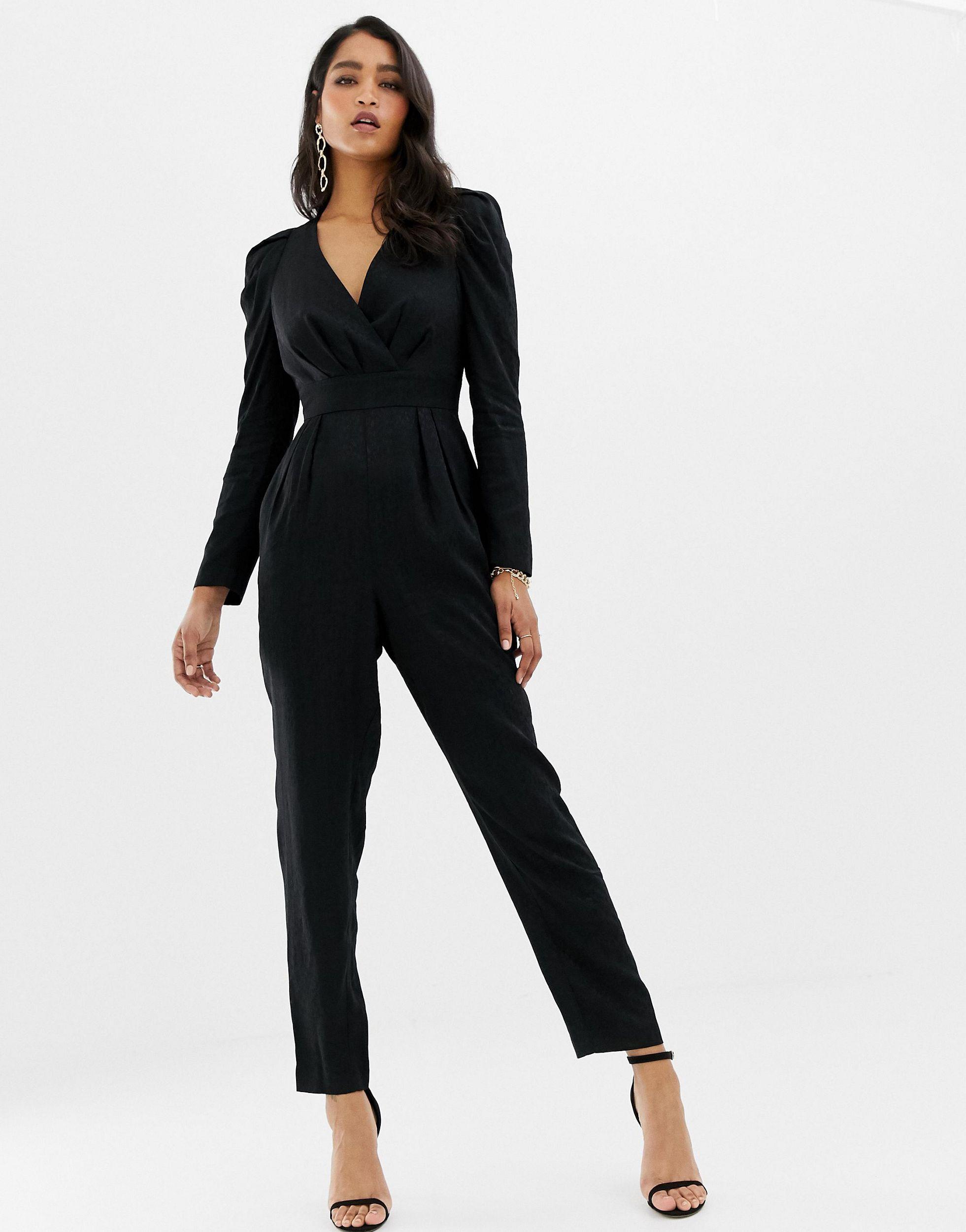 black plunge neck jumpsuit