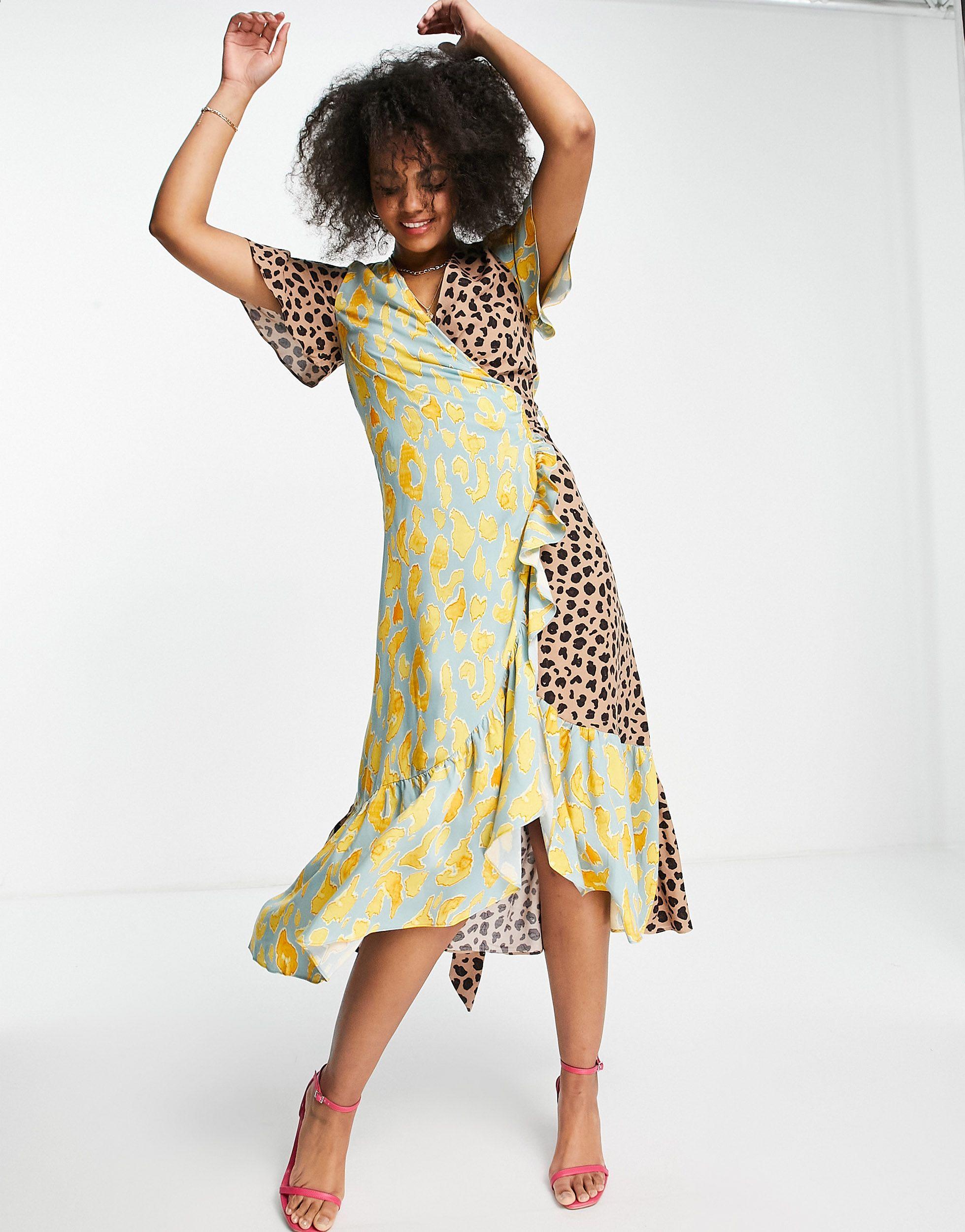 Never Fully Dressed – midaxi-kleid im wickeldesign mit rüschensaum und  kontrastierendem leopardenmuster in Gelb - Lyst