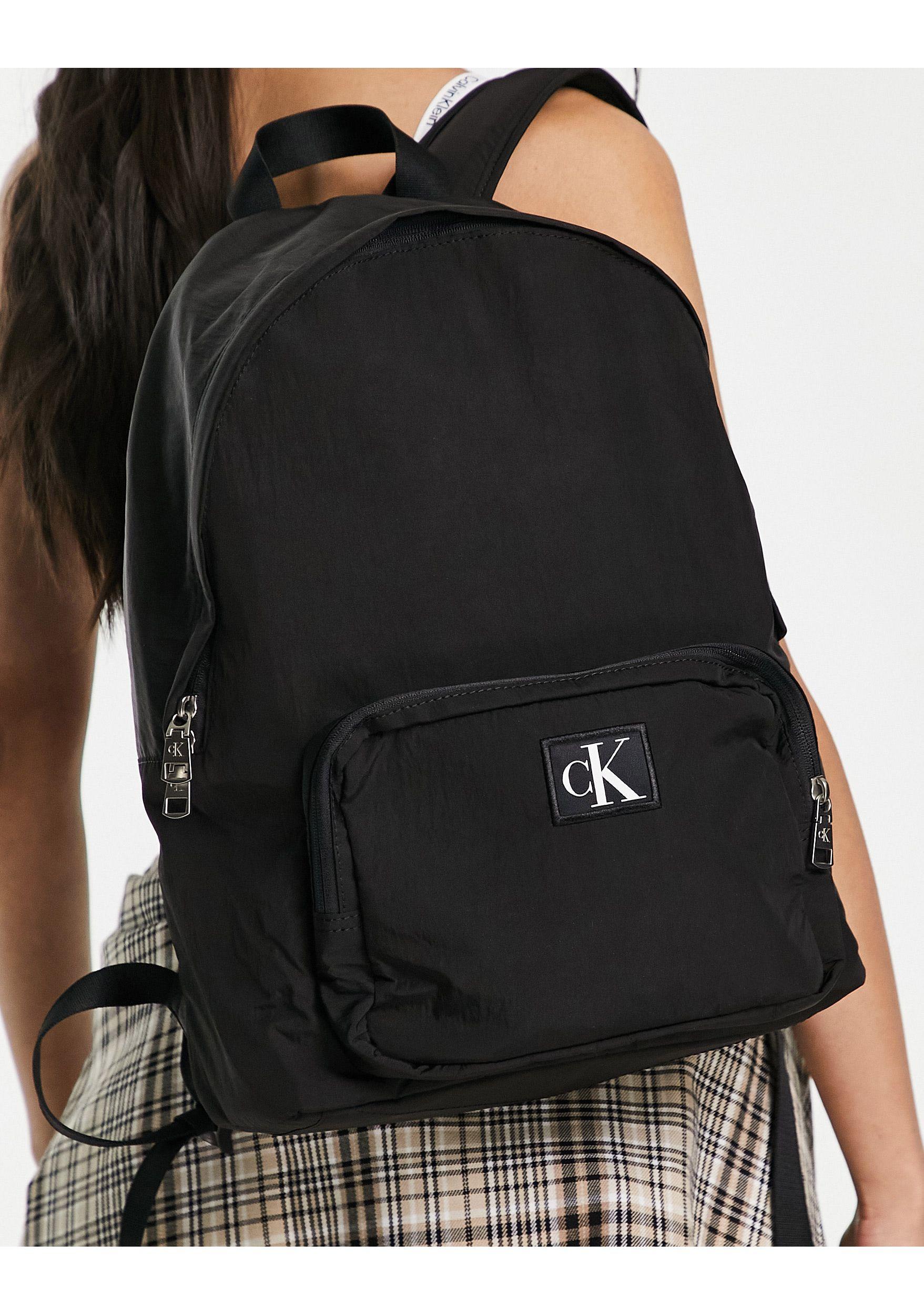 Calvin Klein Jeans Monogram Logo Nylon Backpack in Black