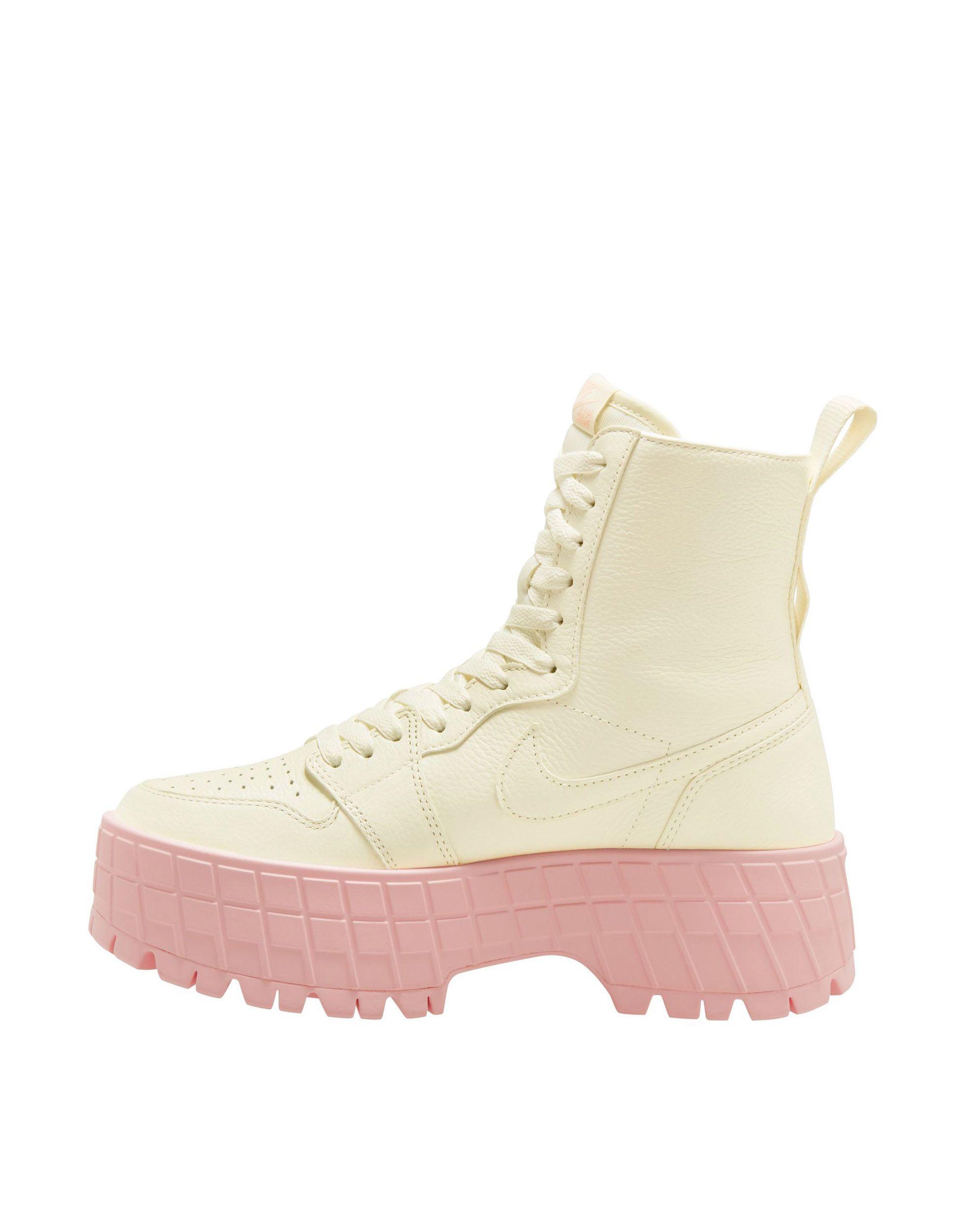 Beige nike boots outlet
