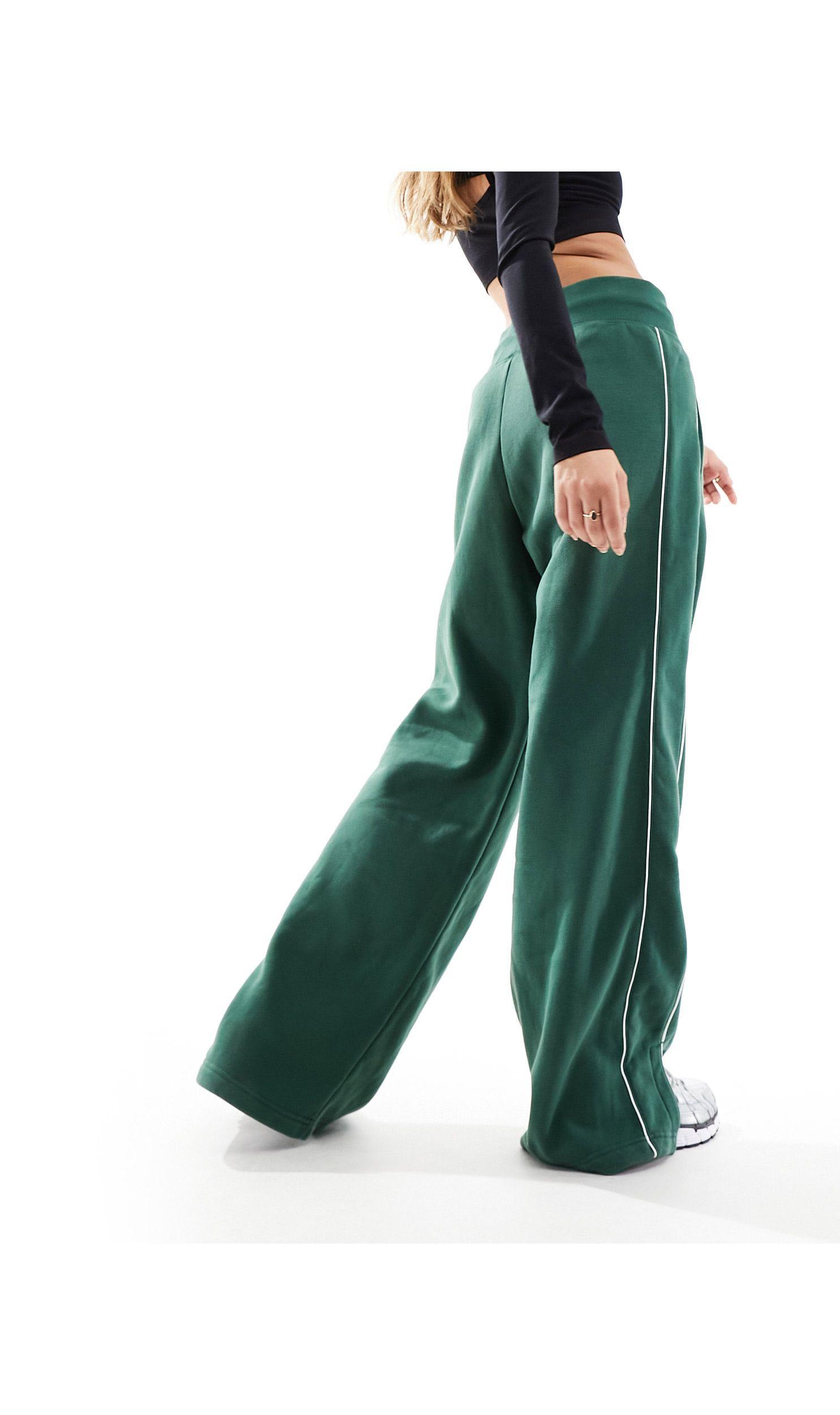 Nike Streetwear oversized fleece wide leg sweatpants in dark green