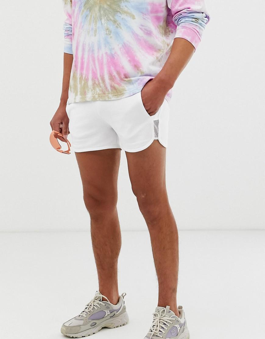 white runner shorts