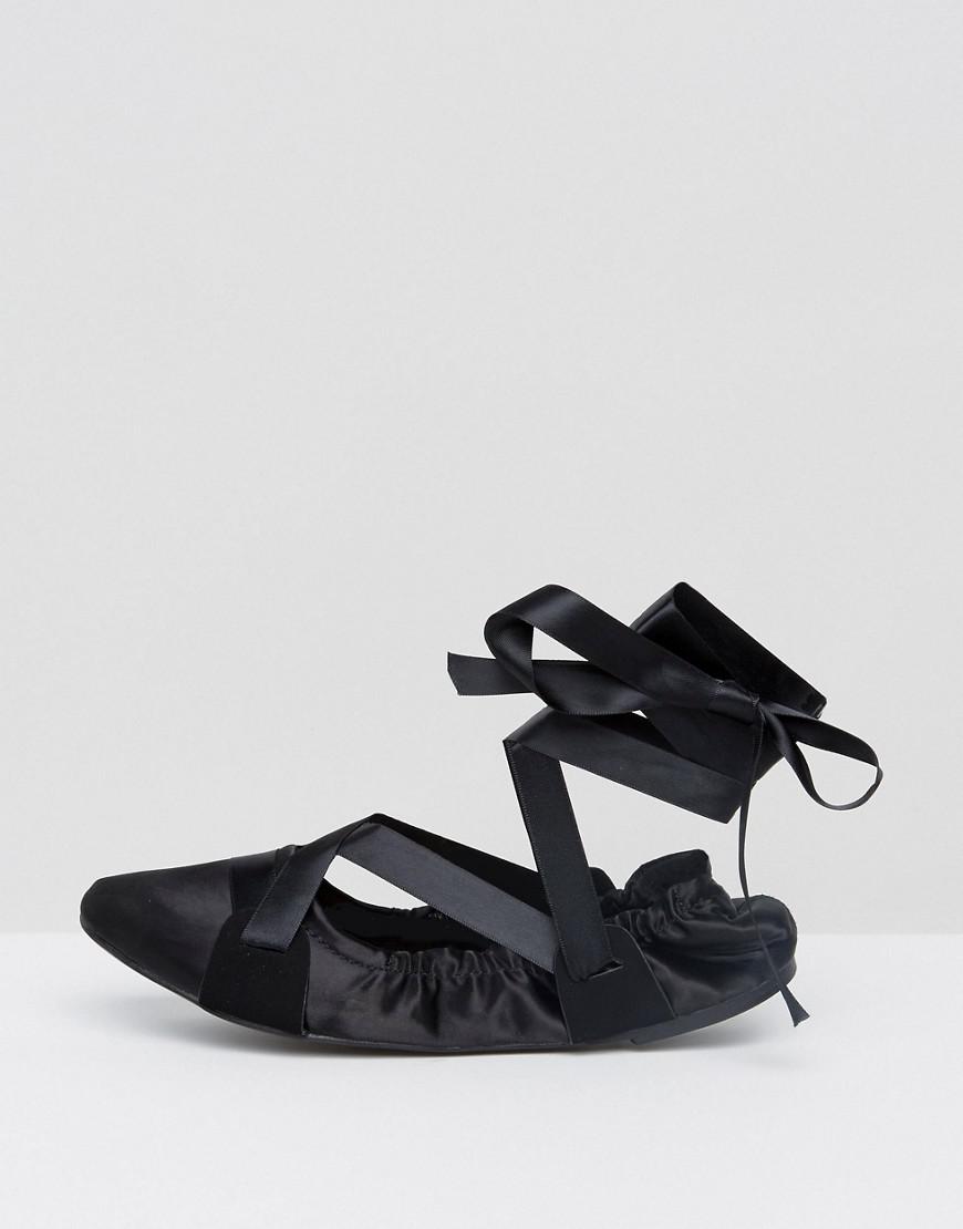 black shoes with ribbon ties