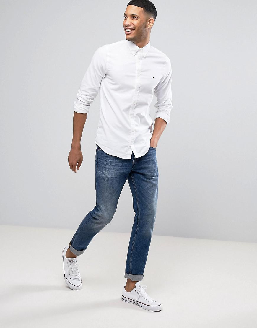white button down and jeans men