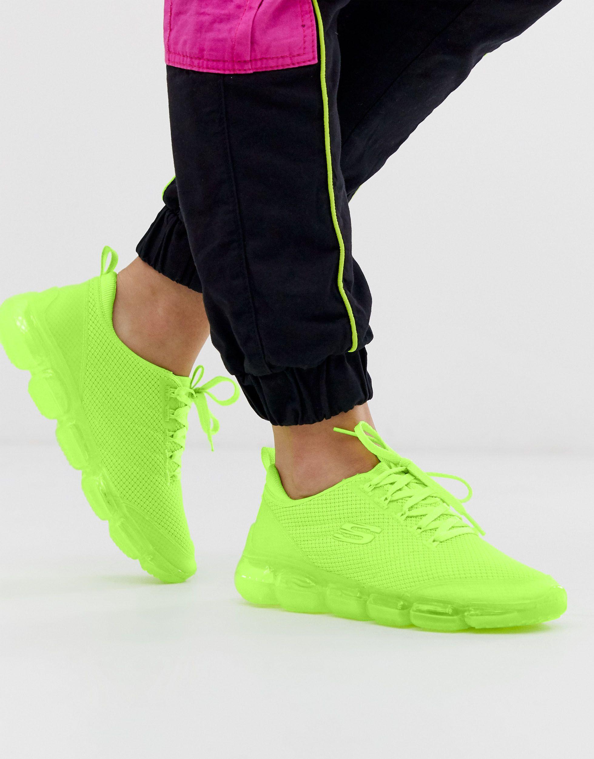 SKECHERS - SCARPA DA GINNASTICA UOMO GRIGIA CON DETTAGLIO GIALLO FLUO –  dalzoppo.it