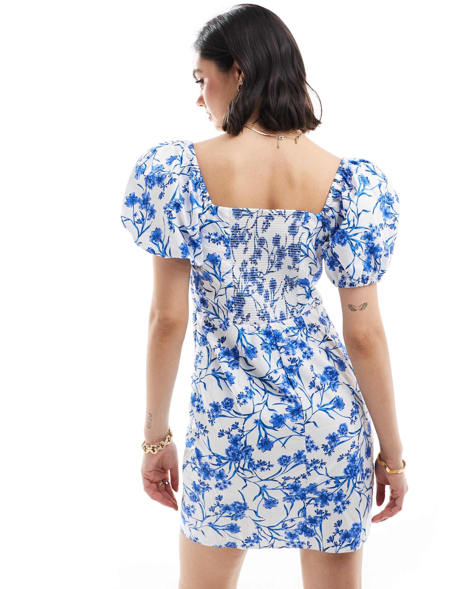 Robe à fleurs avec manches bouffantes Mango en coloris Bleu Lyst