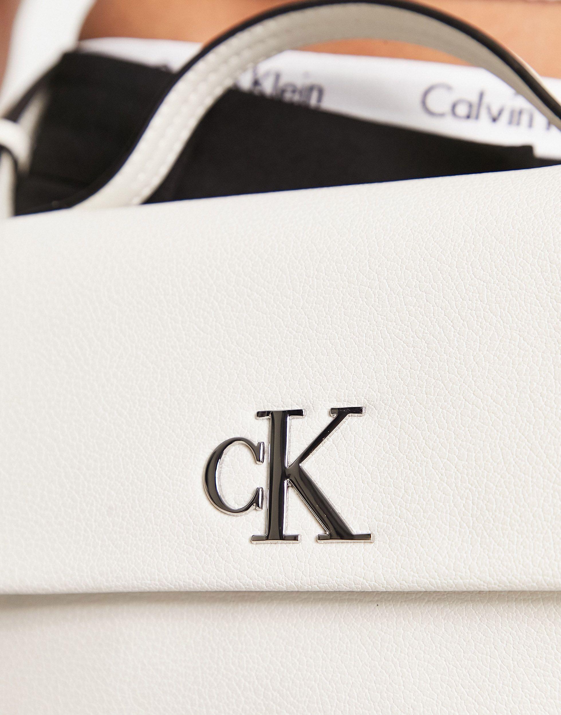 Calvin Klein Monogram Logo Cross Body Bag in White | Lyst