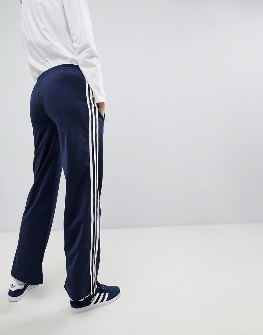 Adidas zipped flare track pants navy