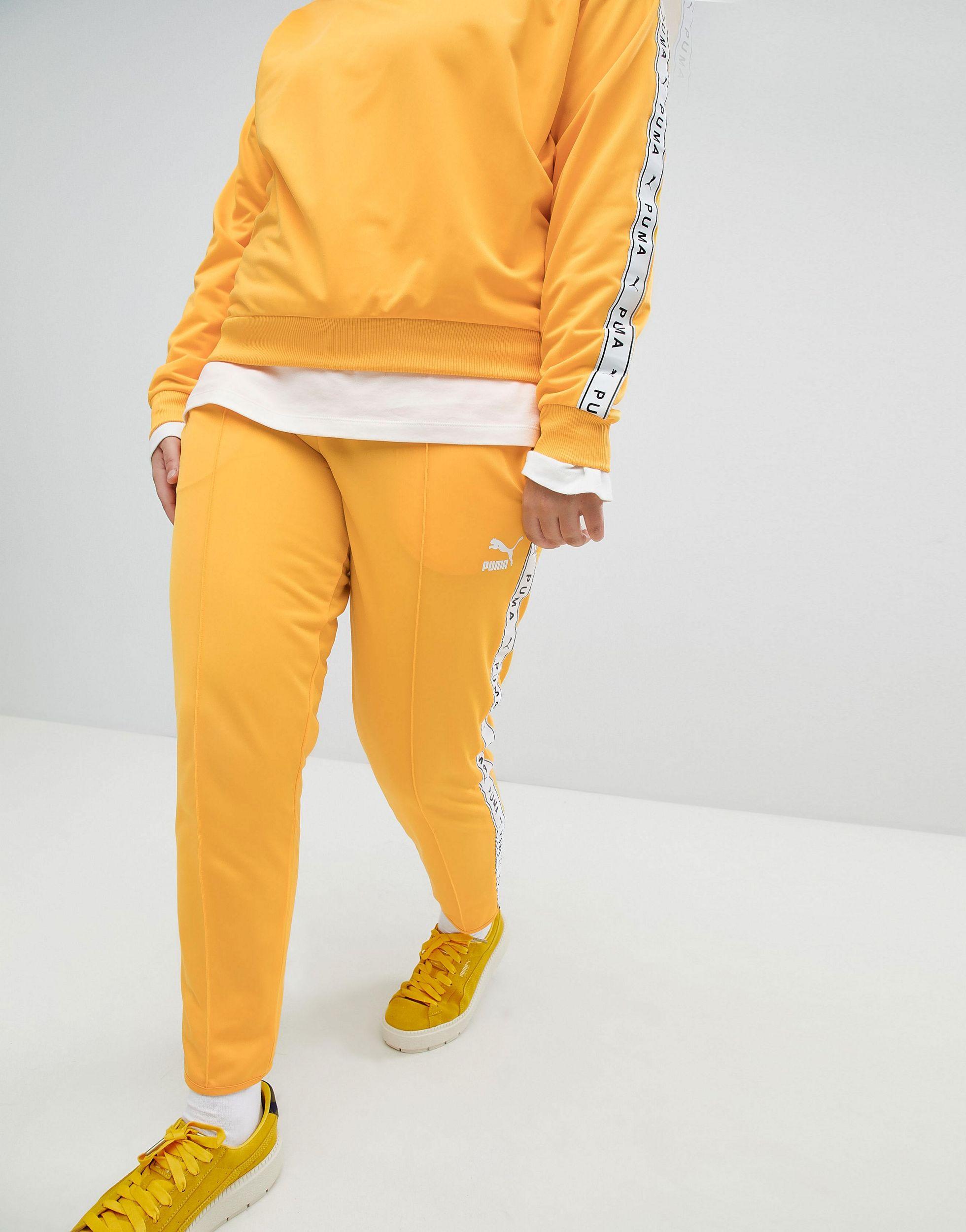 puma taped side stripe track pants