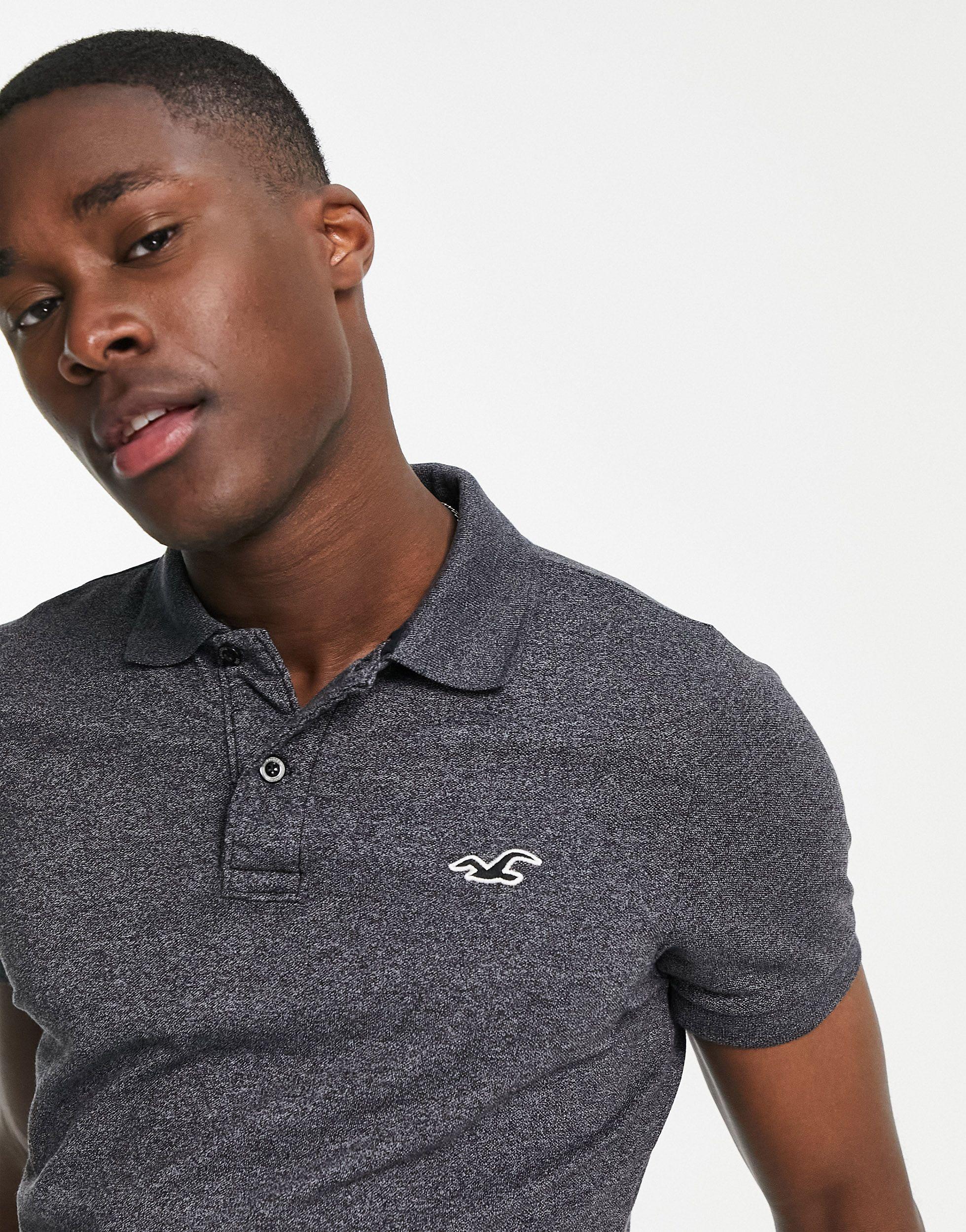 Polo ajustado con logo distintivo Hollister de hombre de color Gris | Lyst