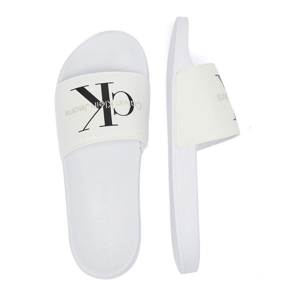 Calvin Klein Denim Slide Monogram Co Sandals in White | Lyst Canada