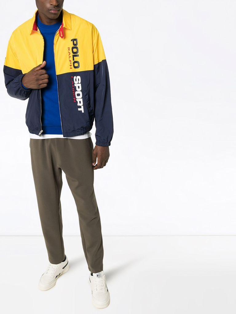 blue and yellow polo jacket