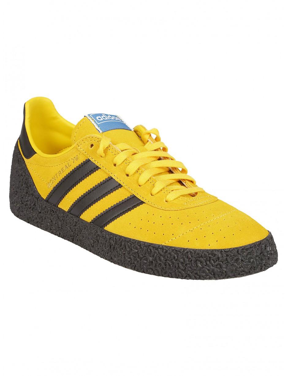 yellow adidas trainers
