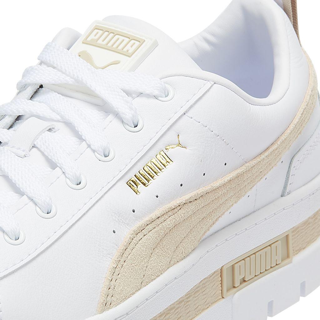 white puma platform trainers