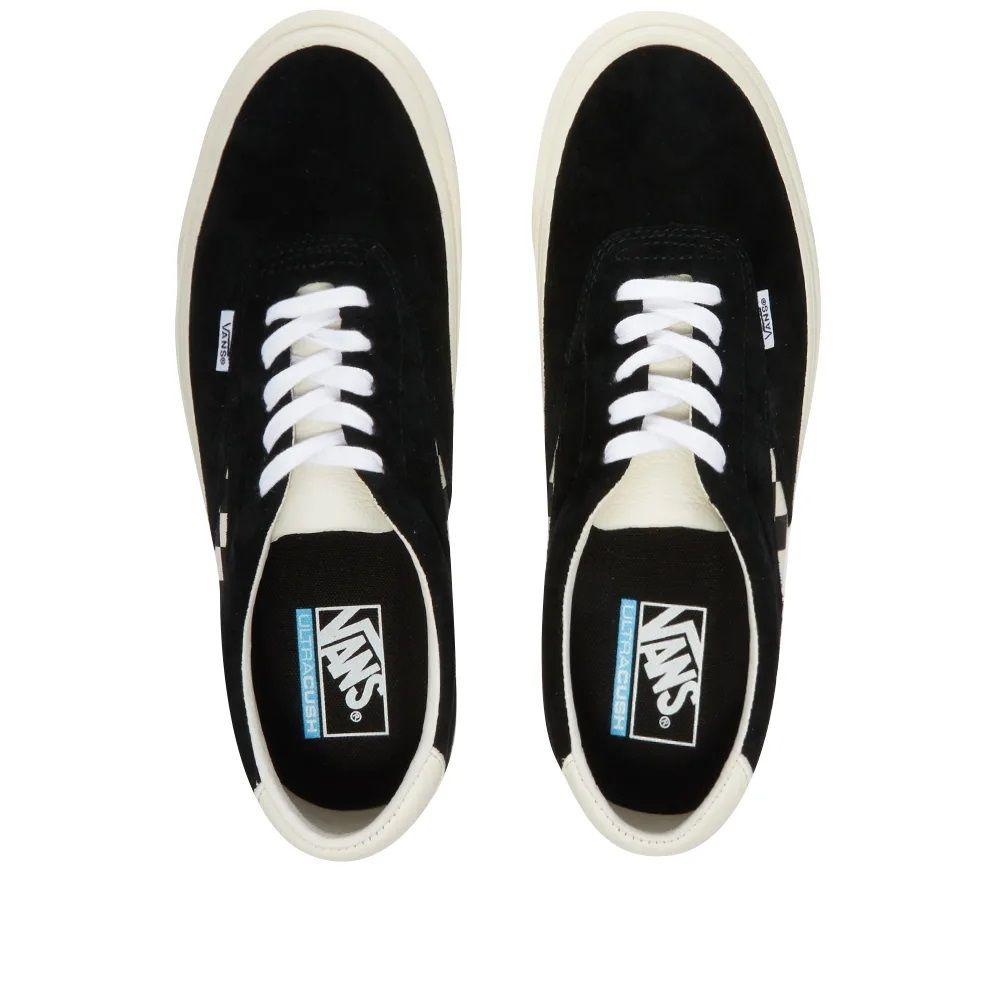 black vans checkered stripe