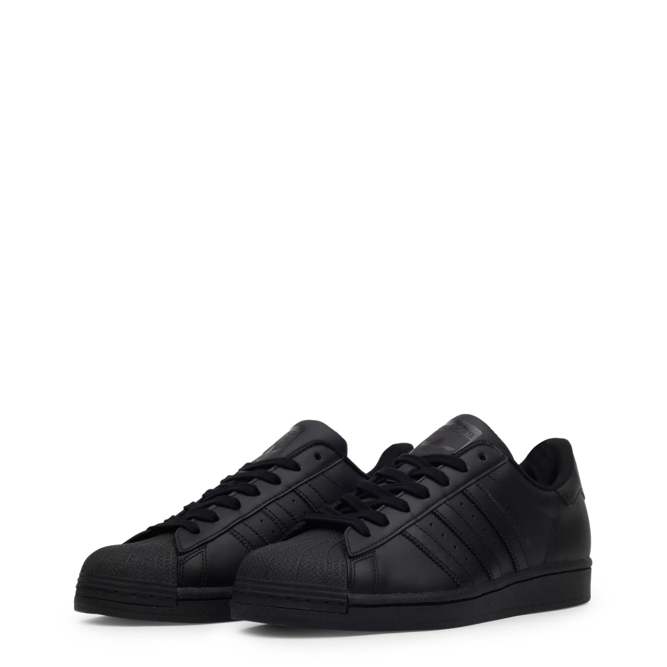 black adidas leather