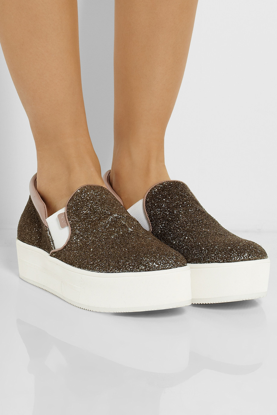 black canvas slip on sneakers