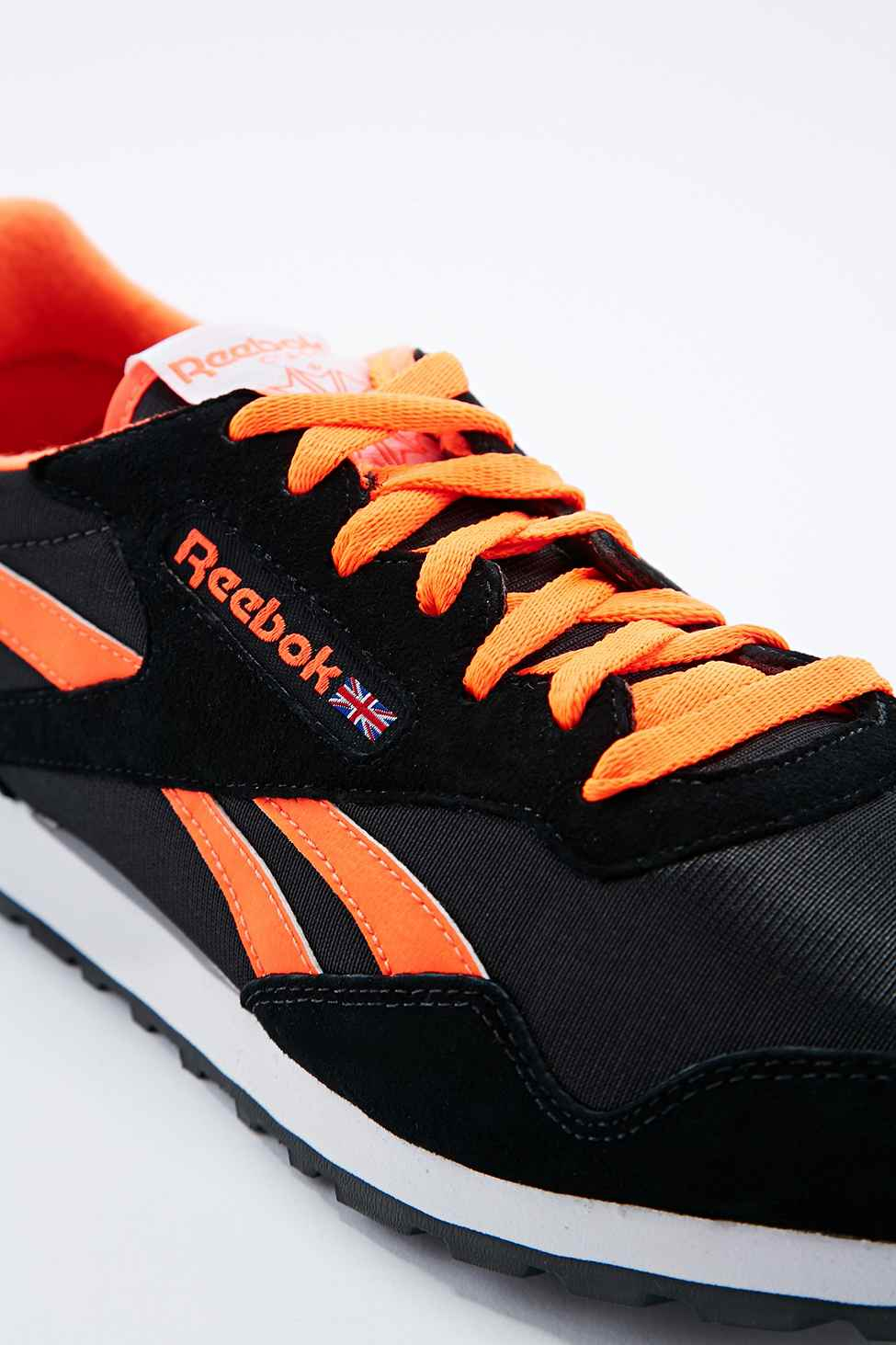 reebok black orange