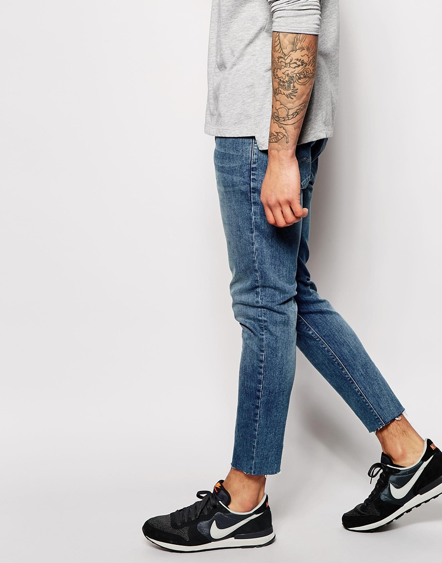 Lyst - Asos Skinny Jeans In Mid Wash With Raw Edge Hem in Blue for Men
