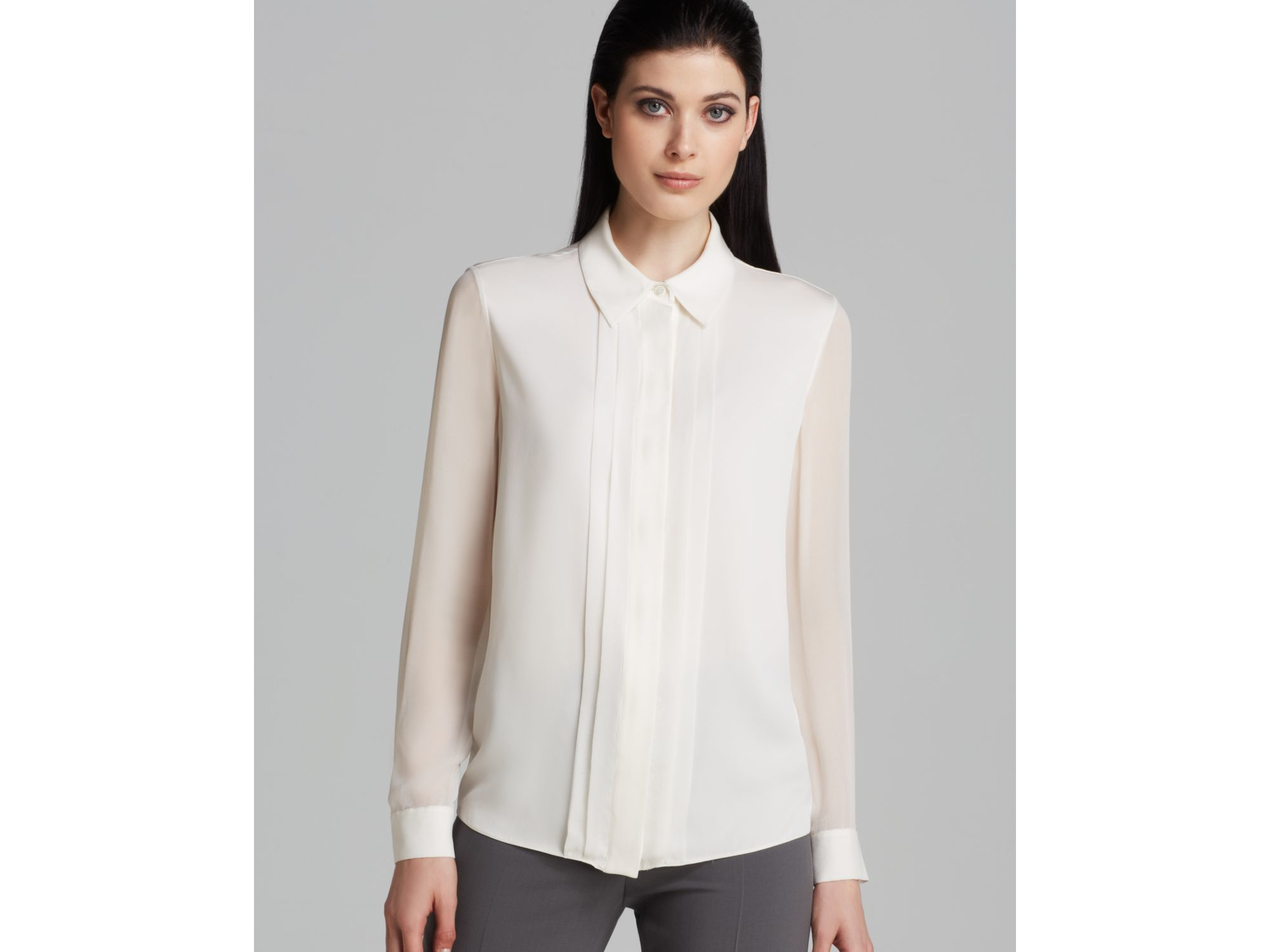 white blouse with sheer sleeves