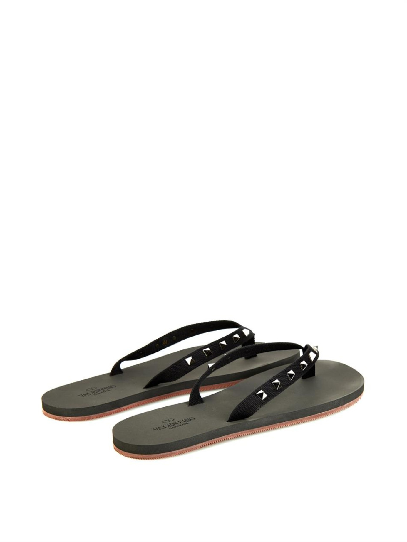 black studded flip flops
