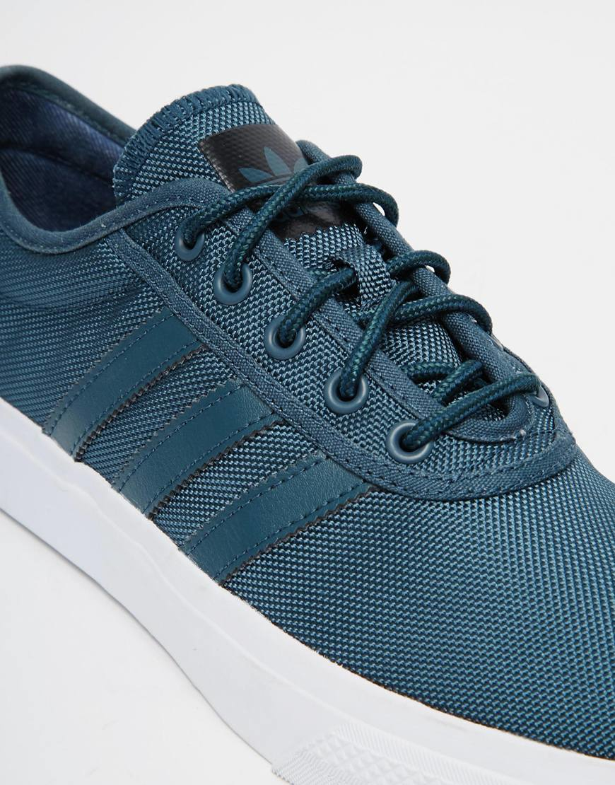 adidas blue canvas trainers