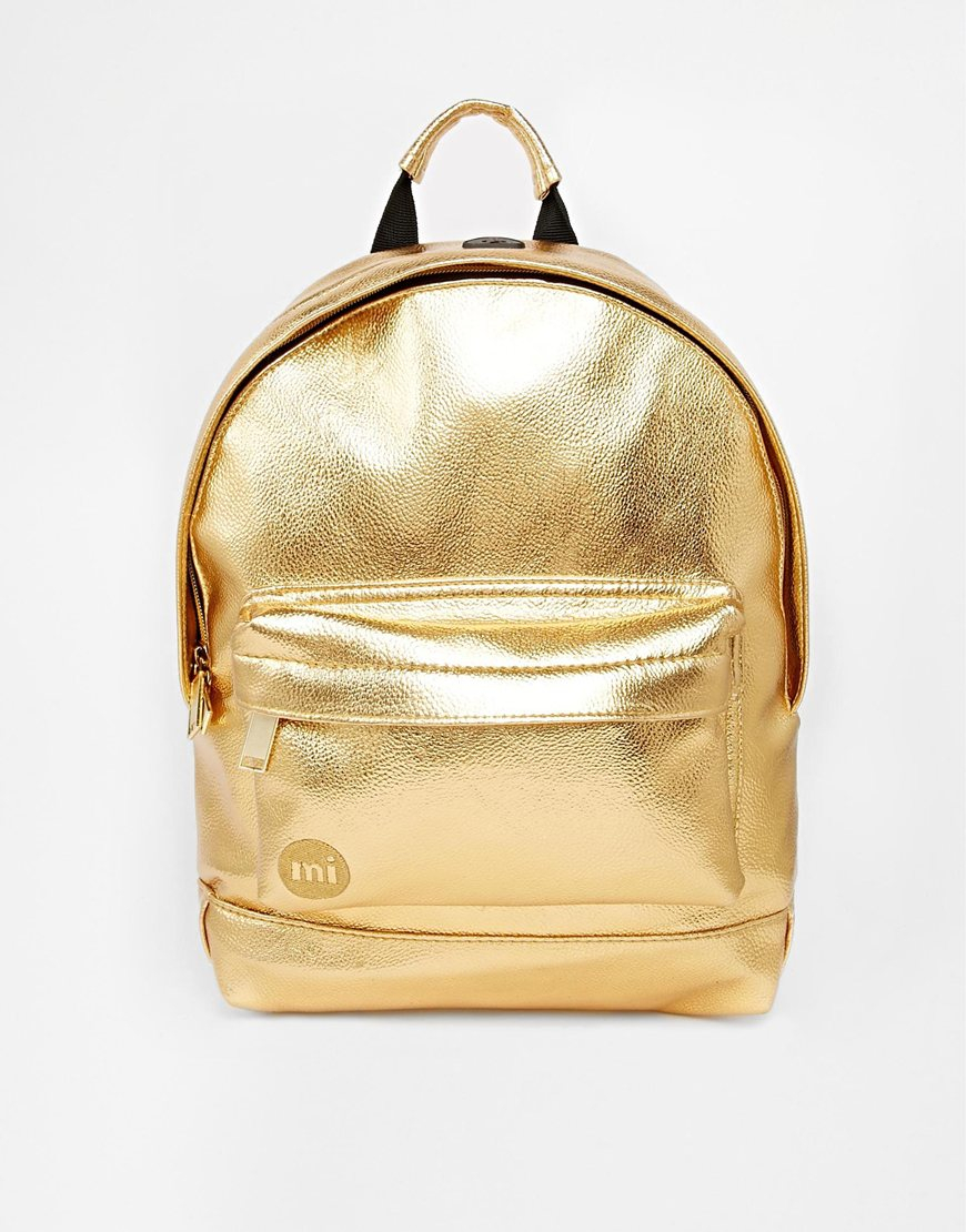 gold backpack purse