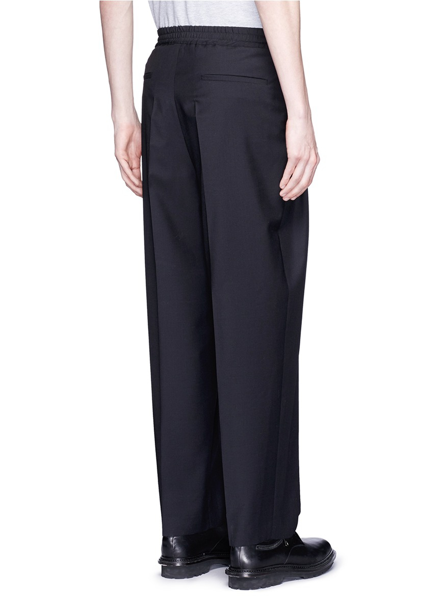 Lyst Mcq Triple Pleat Wool Tapered Pants in Black for Men