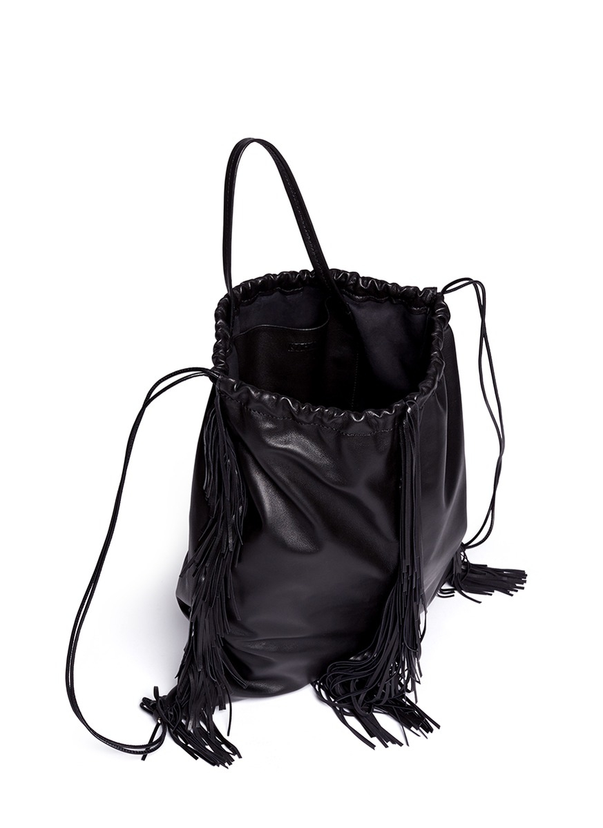 Kara Fringe Leather Drawstring Backpack in Black - Lyst