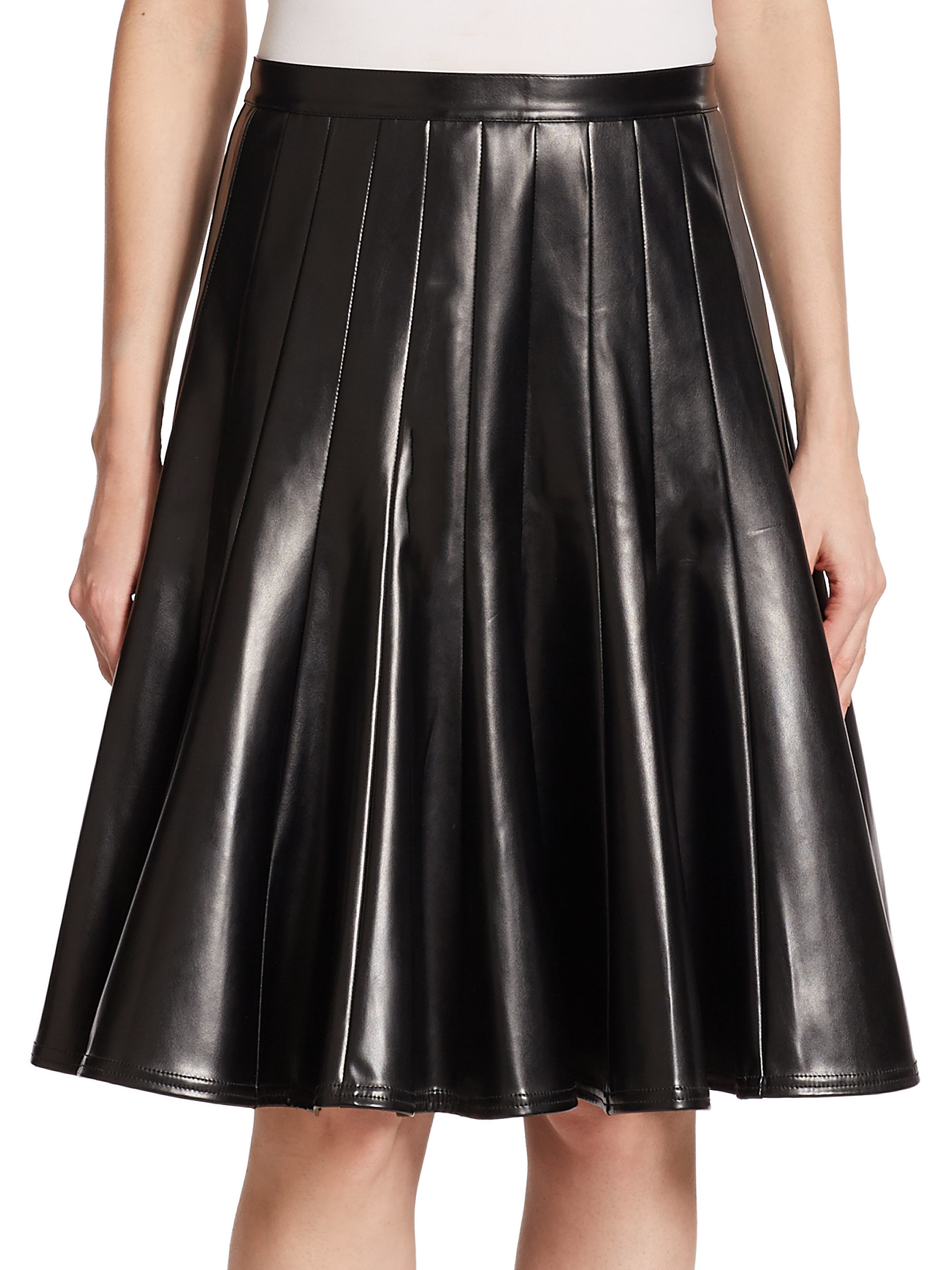 We couldn't find what you were looking for, But here are some other options. Made form lamb leather this skirt has fitted waist. It also has center zipper closure that adds element of beauty in this skirt. It is a fully lined leather skirt with hook fastening. This is a completely pleated flared skirt for women. This skirt is available in several colors and size. Women grab this leather skirt today and make your own style statement.
