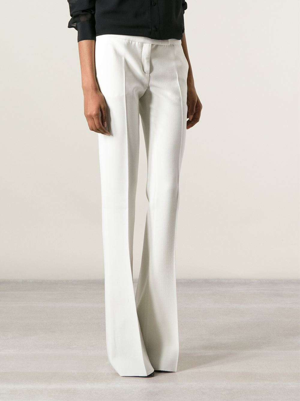 white flared trousers