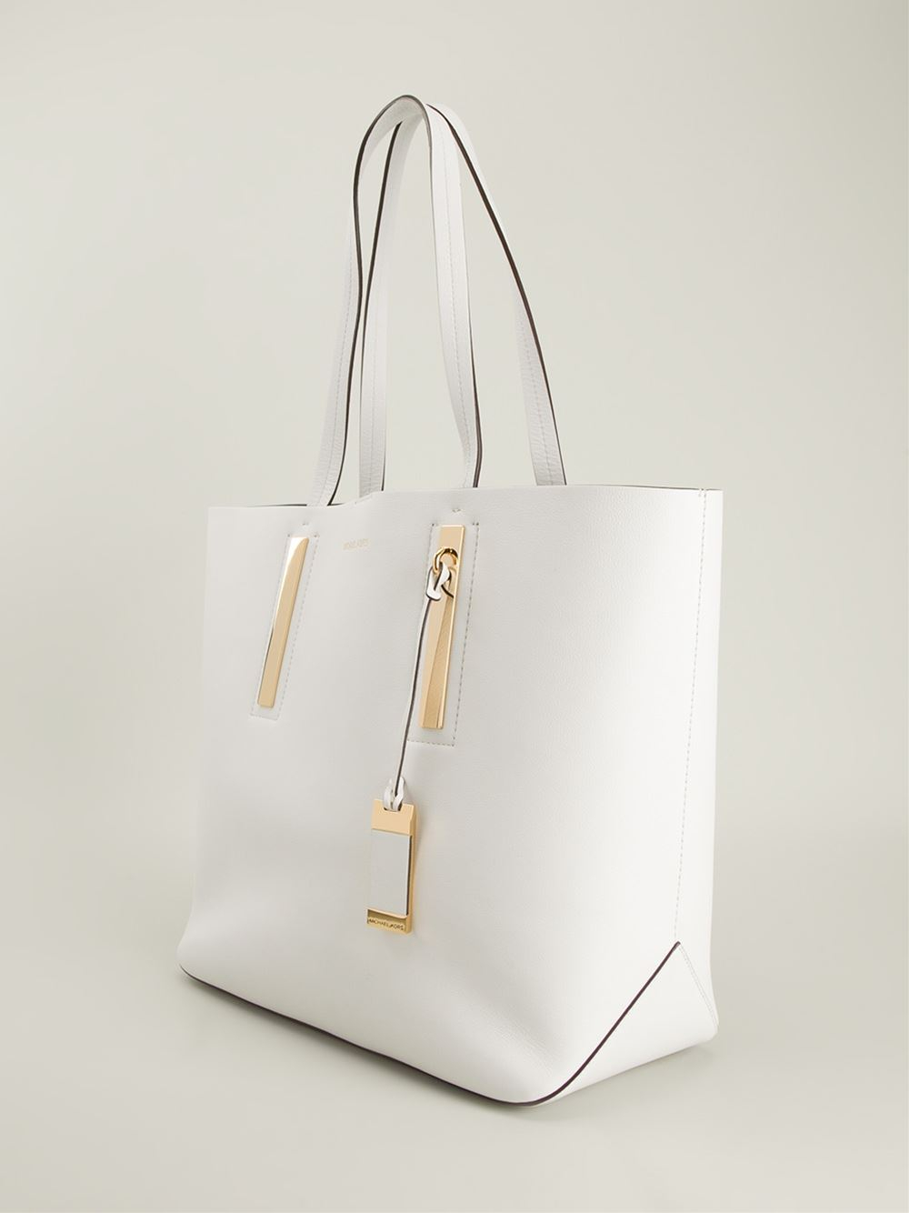 white and gold shoulder bag