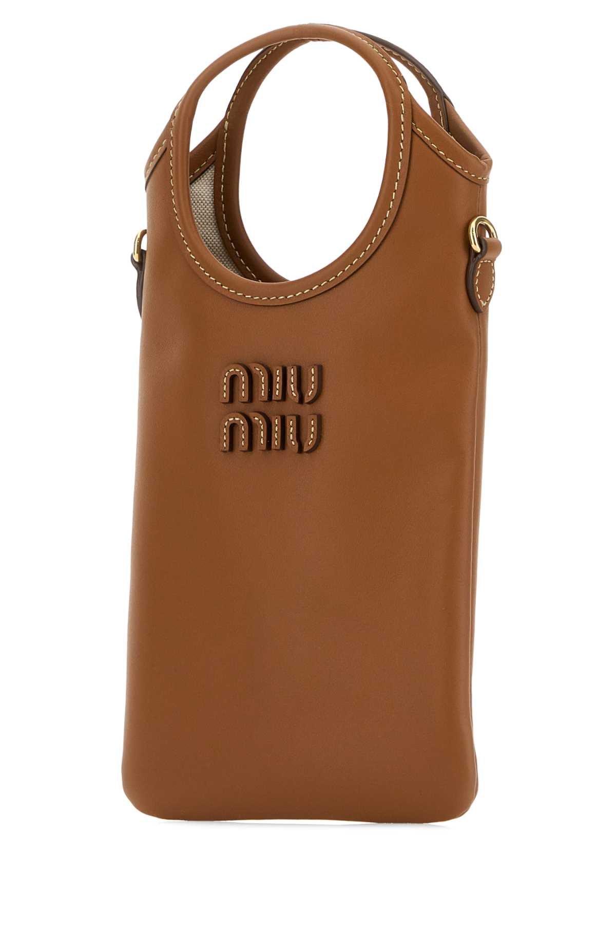 Miu Miu Phone cases for Women | Online Sale up to 46% off | Lyst UK