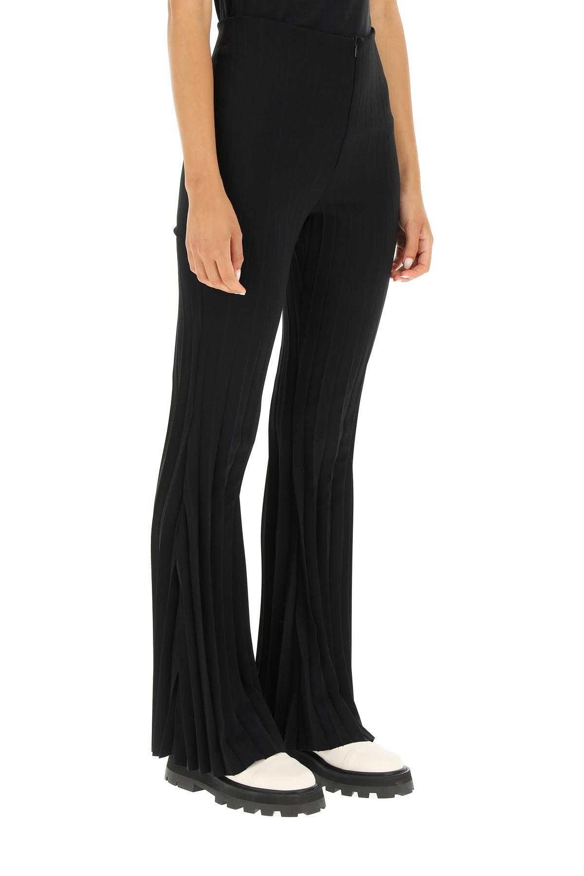 A.W.A.K.E. MODE Pleated Flare Trousers in Black | Lyst