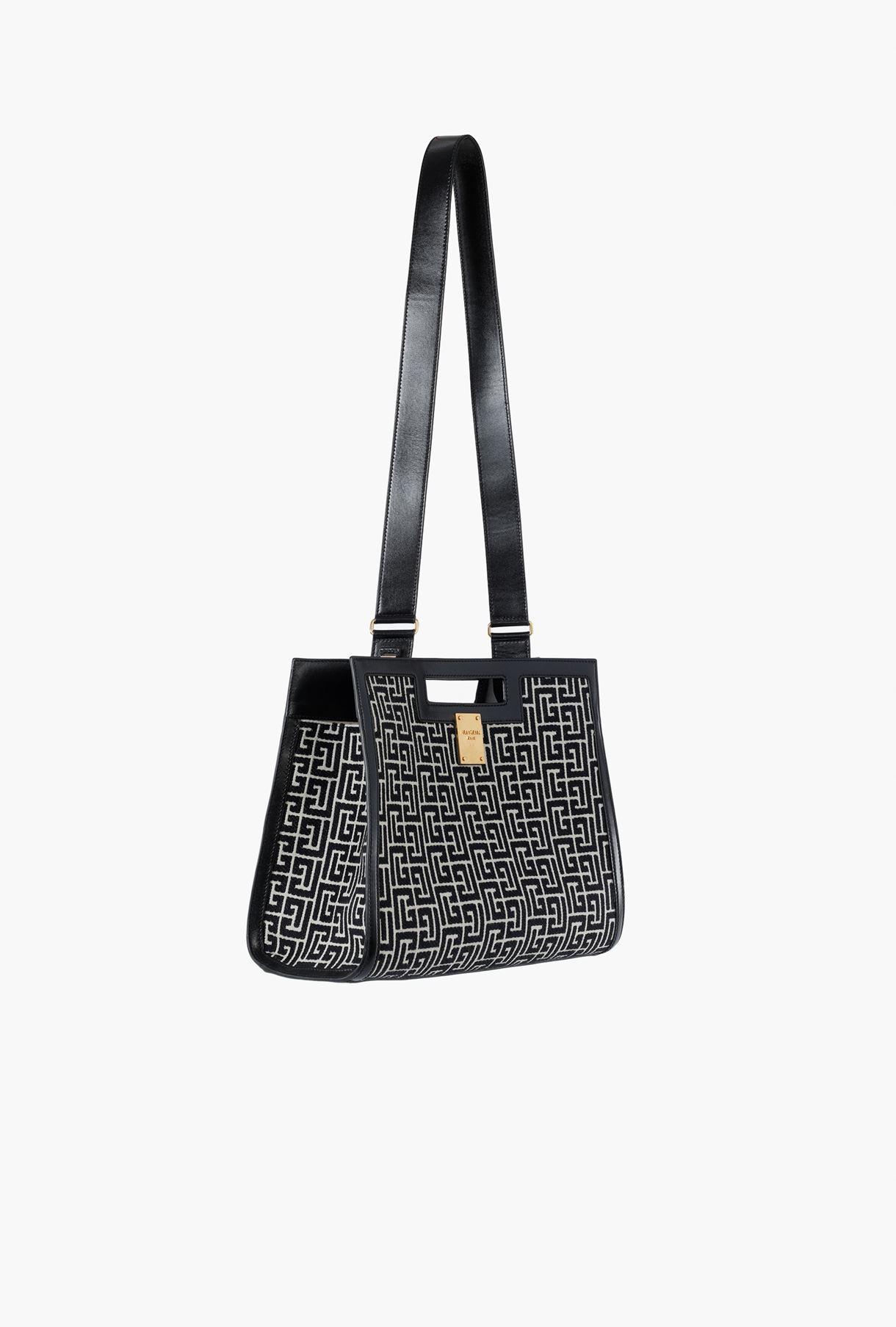 medium sized black handbag