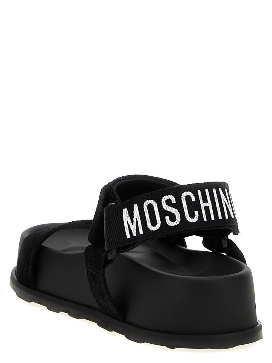 Moschino Flat sandals for Women | Online Sale up to 60% off