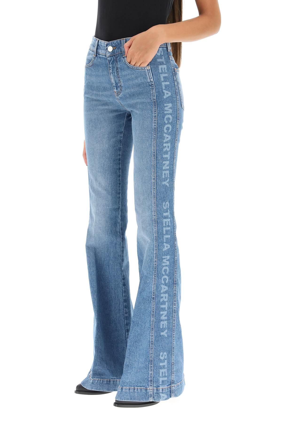 Stella McCartney Denim Flared Jeans With Logo Bands in Blue Save 7% Womens Clothing Jeans Flare and bell bottom jeans 