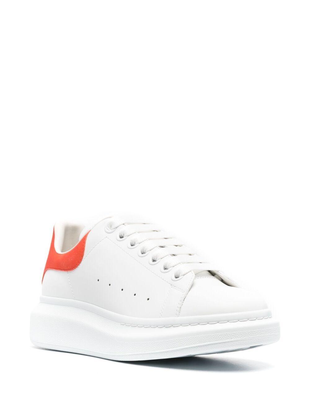 orange and white alexander mcqueen sneakers