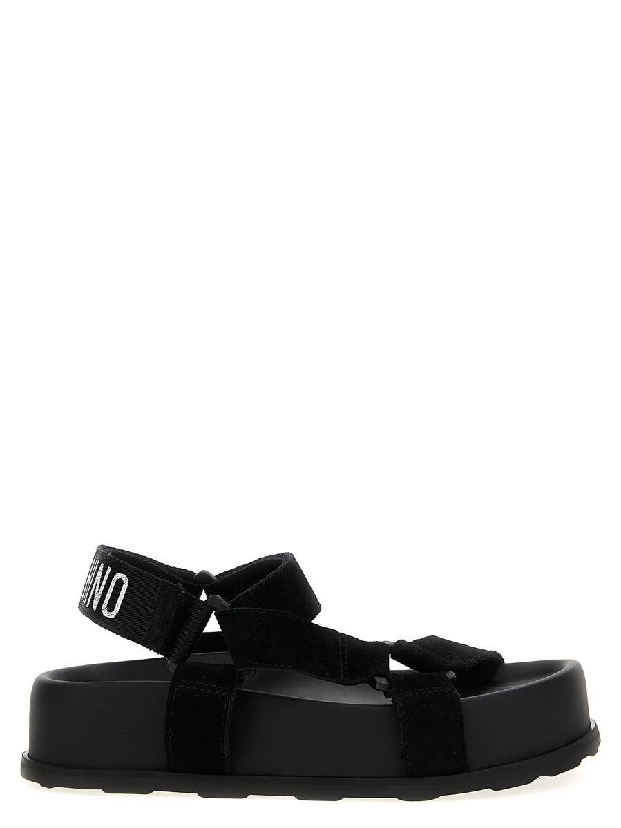 Moschino Flat sandals for Women | Online Sale up to 60% off