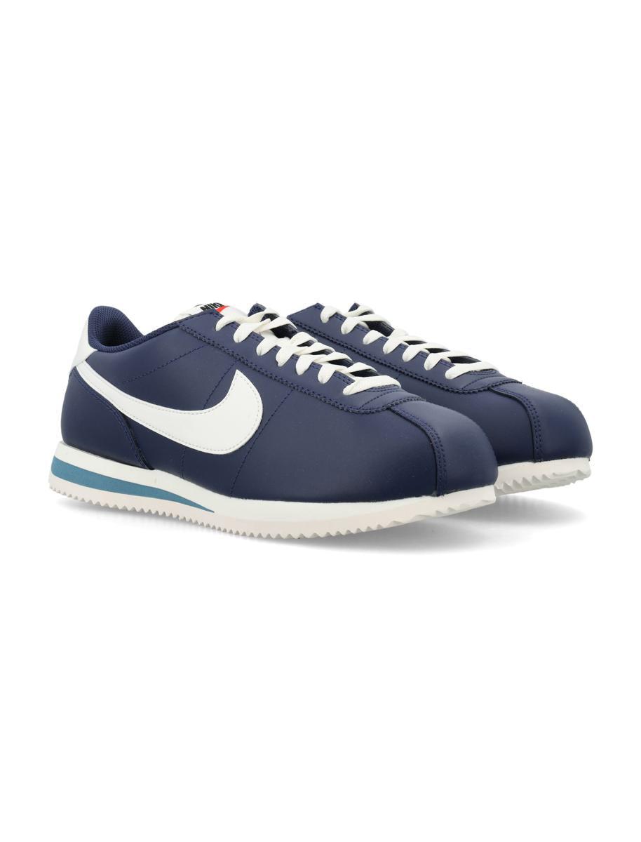 Nike cortez clearance black and blue