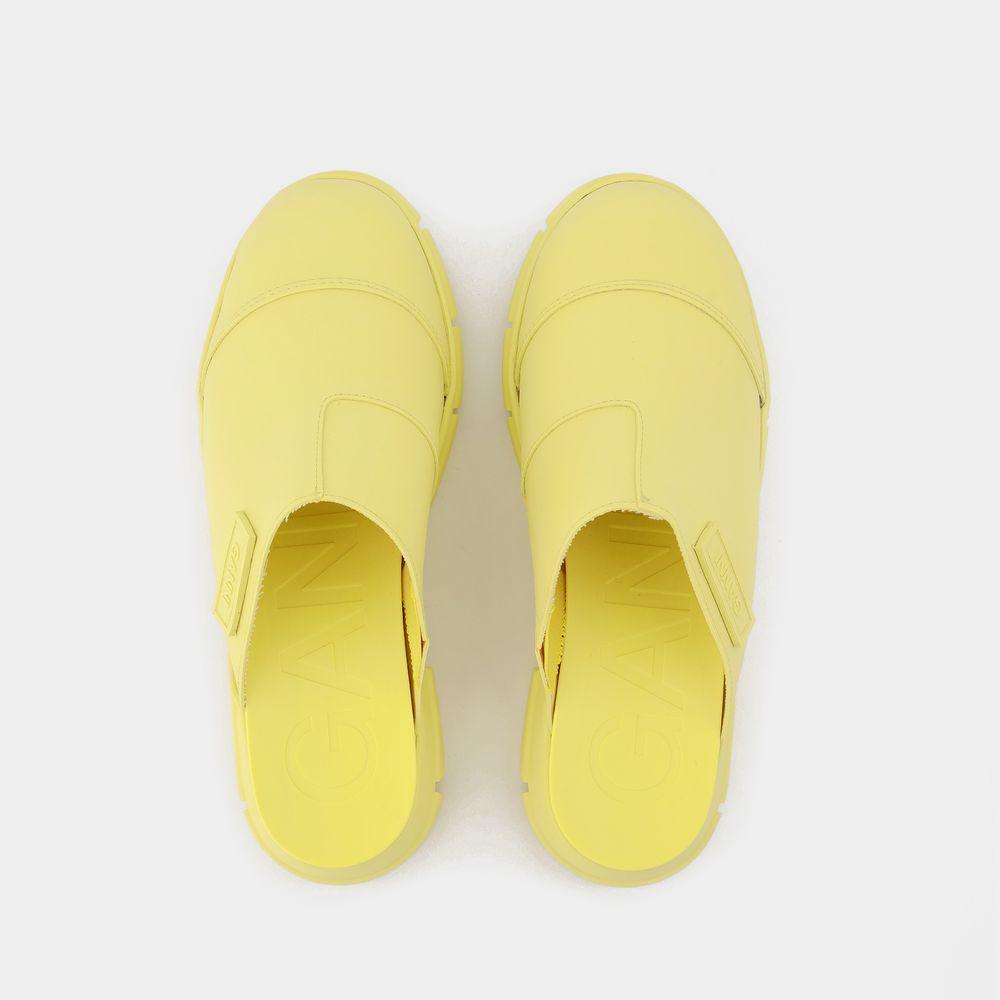【関税込み】Yellow Recycled Rubber Retro Mules Ganni Recycled Rubber Retro Mules in Yellow | Lyst UK