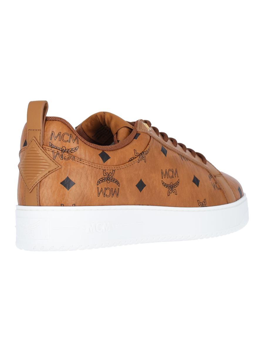 MCM brown luxury sneakers showcasing premium leather craftsmanship and iconic design