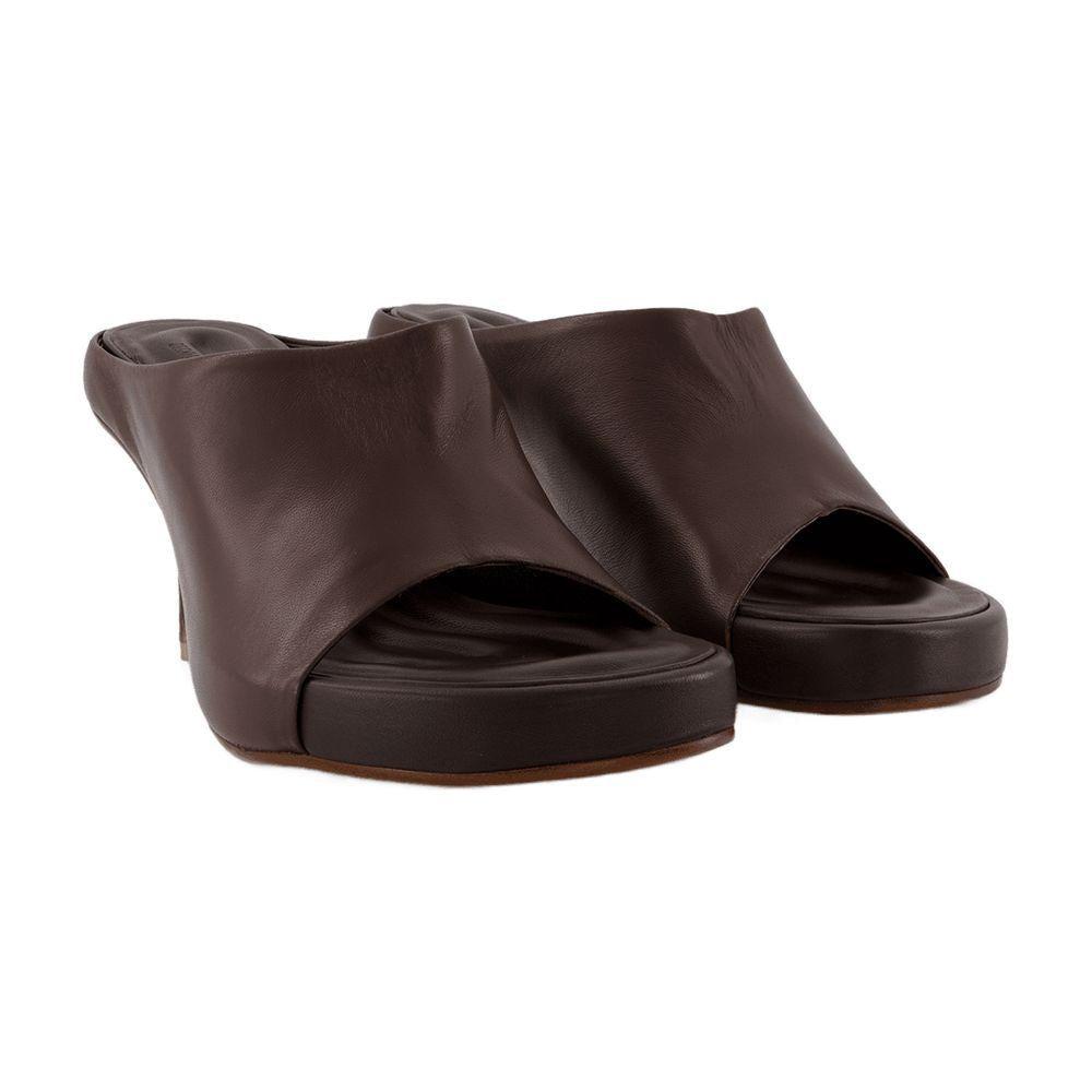 サンダル・ミュール JACQUEMUS Nuvola Mules in Brown Leather Les Mules Nuvola leather mules in brown - Jacquemus | Mytheresa