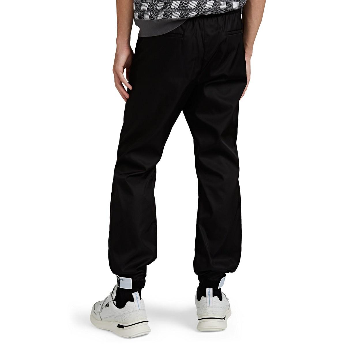Prada Rubber Logo-cuff Jogger Pants in Black for Men - Lyst