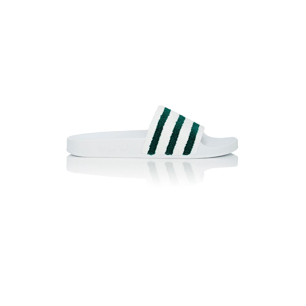 white adidas adilette slides
