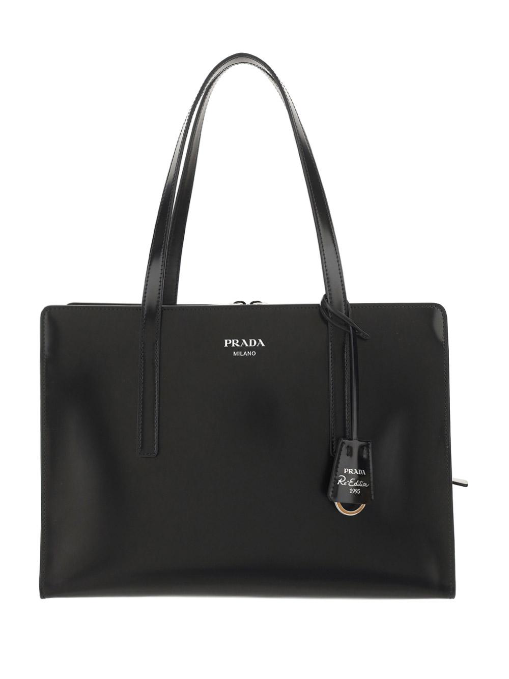 Prada Handbags in Black | Lyst