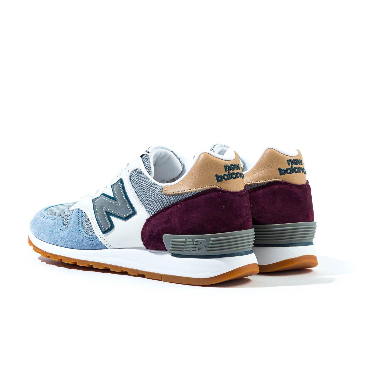 white and purple trainers
